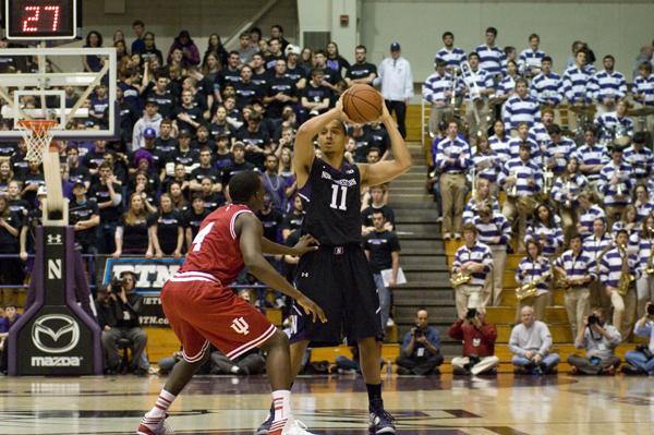 Senior guard Reggie Hearn surveys the floor against Indiana. Northwestern fell to Ohio State on Thursday, keeping the score within four points until just under two minutes left. 