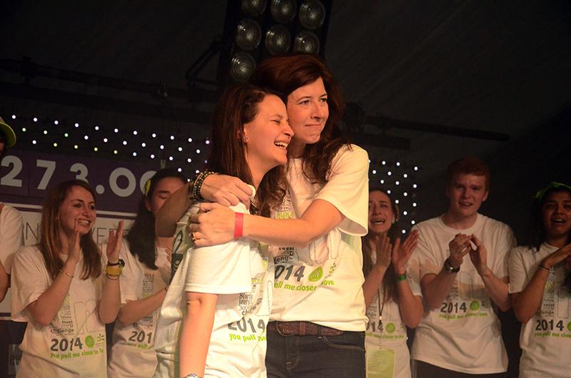 Marissa Penrod (right), the founder of Team Joseph, hugs Dance Marathon executive co-chair Anna Radoff during Block 10. Penrod expressed her gratitude toward DM for choosing her cause.