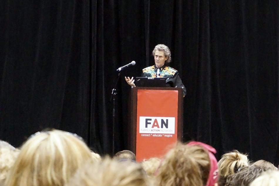Temple Grandin speaks during her lecture at Welsh-Ryan Arena Wednesday night. Grandin highlighted the importance of encouraging different thinking styles, particularly with autistic children.