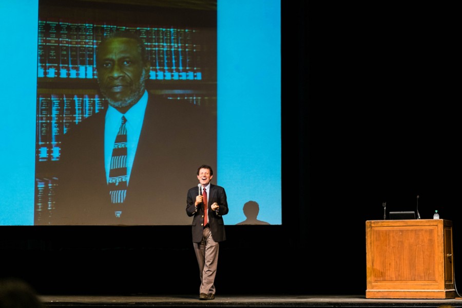 Nicholas Kristof addresses the audience in Cahn Auditorium on Monday night. Kristof shared a variety of personal stories as well as advice for how to make a meaningful difference in global issues.