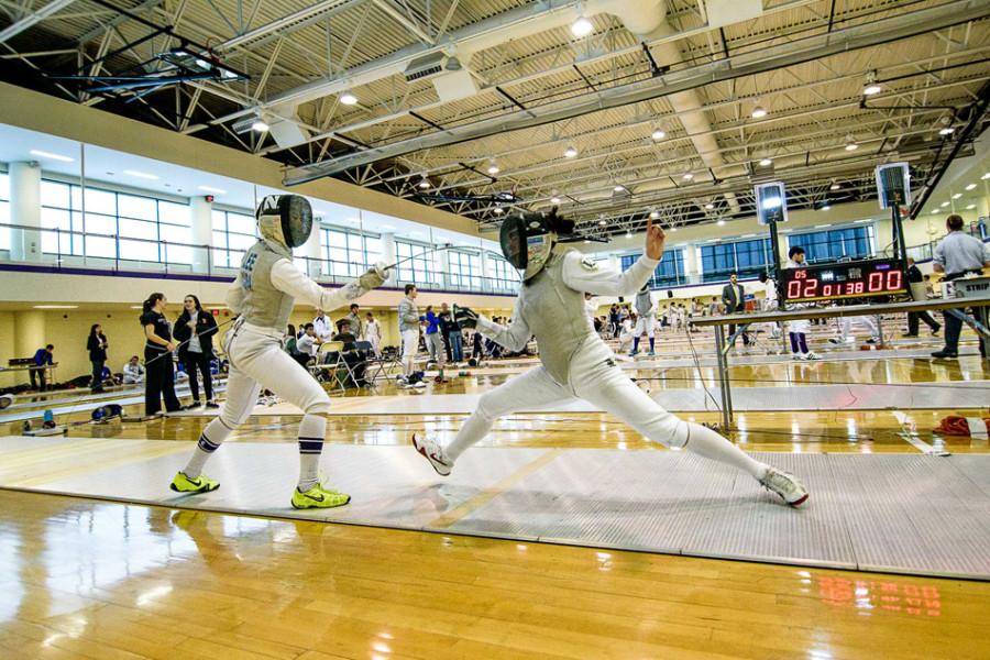 Michelle Lee lands a hit on a lunging opponent. The freshman contributed to Northwestern’s strong performance in the team’s latest duals meet.