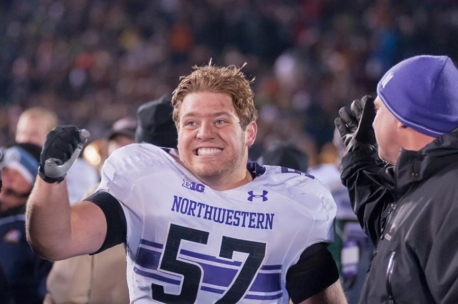 Guard Matt Frazier celebrates following last year’s win over Notre Dame. Frazier made his 2015 debut last Saturday following a tumultuous offseason.