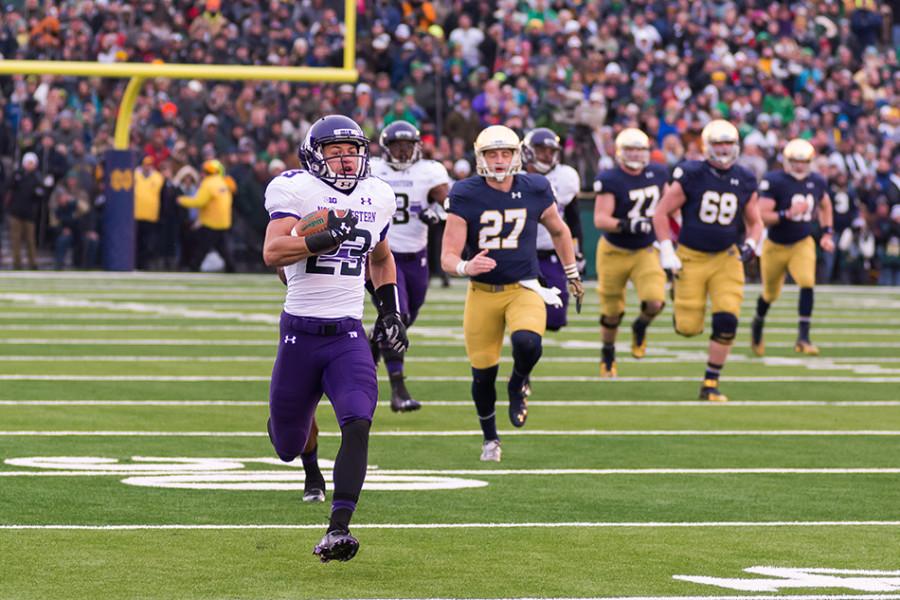 Nick VanHoose runs back an interception. The senior cornerback will miss the Outback Bowl with a hand injury.