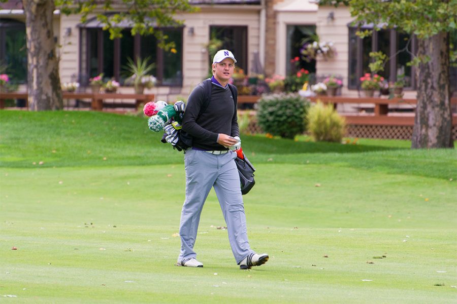 Josh Jamieson walks across a golf course. The NU senior is looking to finish his collegiate golf career strong, as the Cats prepare for the NCAA Tournament.