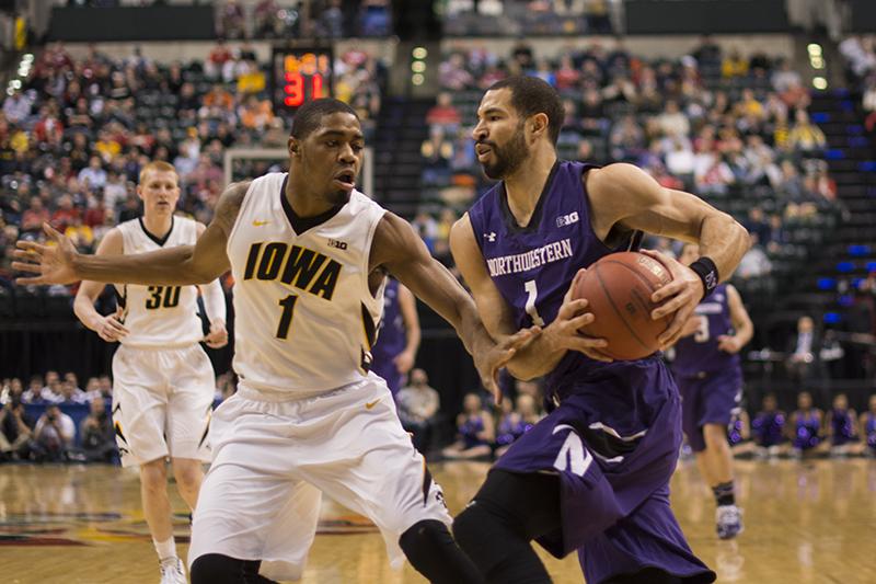 Former Wildcat guard Drew Crawford attacks the paint in a 2014 game. Crawford is one of three Northwestern alumni slated to play in The Basketball Tournament for a team put together by former Cats Tim Doyle and Craig Moore.