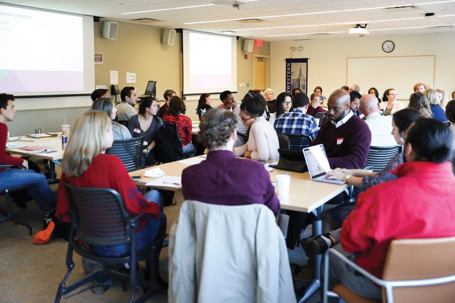 Students gather at Searle Hall on Tuesday for the Campus Coalition on Sexual Violence’s fall meeting. Members of SHAPE, CARE, MARS and other groups presented updates at the meeting.