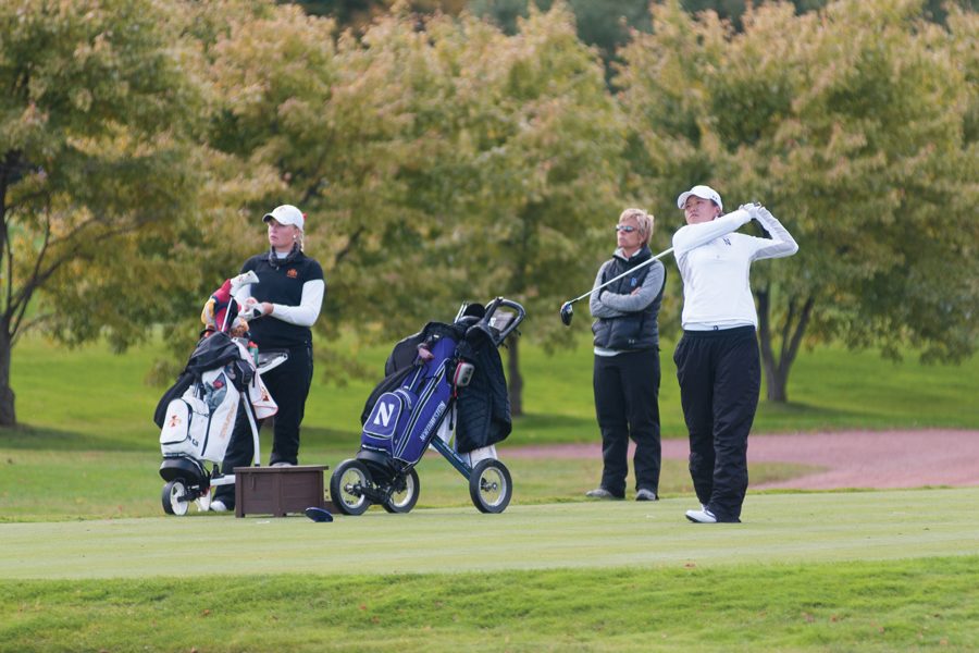 Hannah Kim hits a chip shot during her 2014 freshman year.