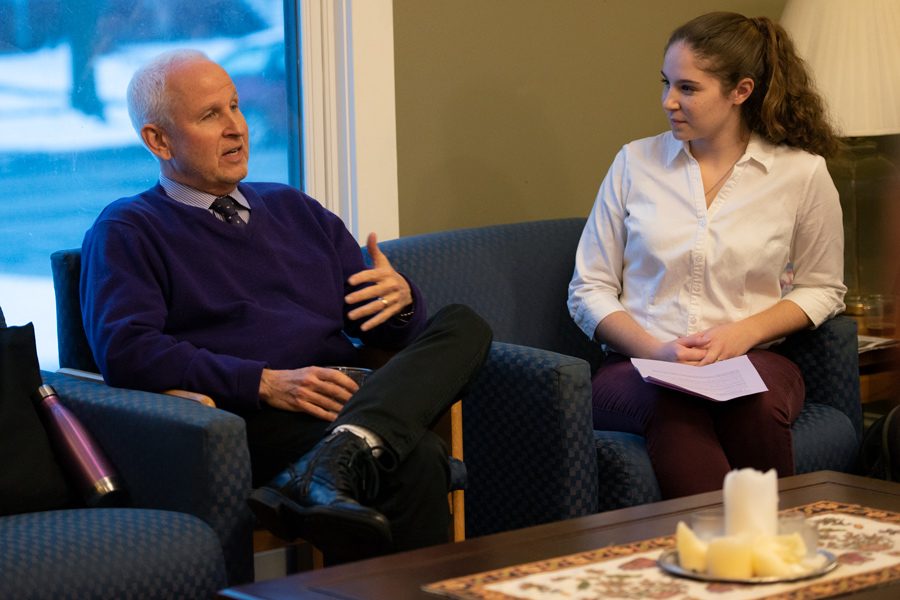 University President Morton Schapiro discusses his faith with Taylor Brown at Canterbury House. Schapiro said he would not be able to be University president if not for his practice of attending Shabbat services every week.