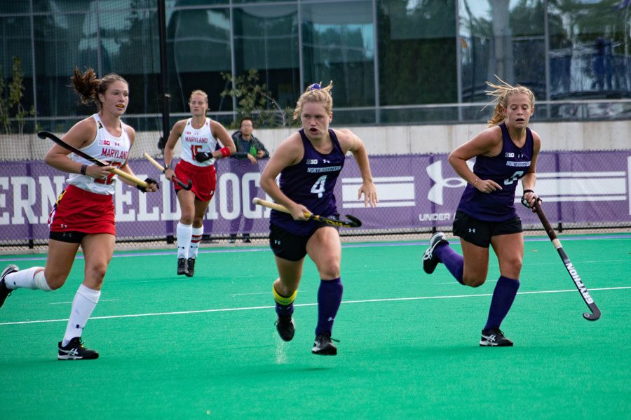 Senior midfielder Lily Katzman pushes the ball out of the defensive zone and into midfield.