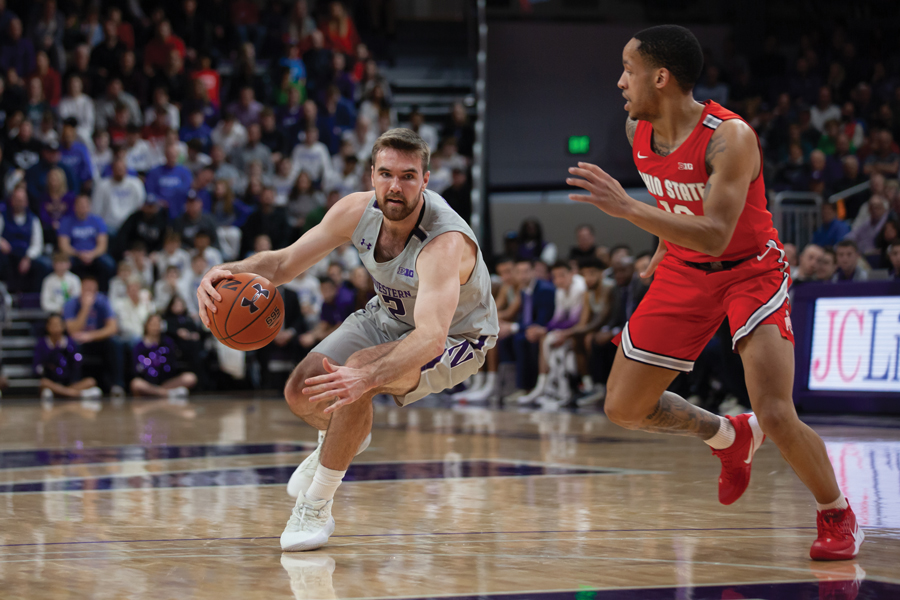  Pat Spencer attacks the basket. The grad transfer guard is expected to start against Ohio State. 