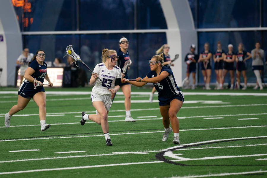 Lindsey McKone gears up to shoot. The senior attacker was named Big Ten Offensive Player of the Week after scoring six goals and having five assists in two games.