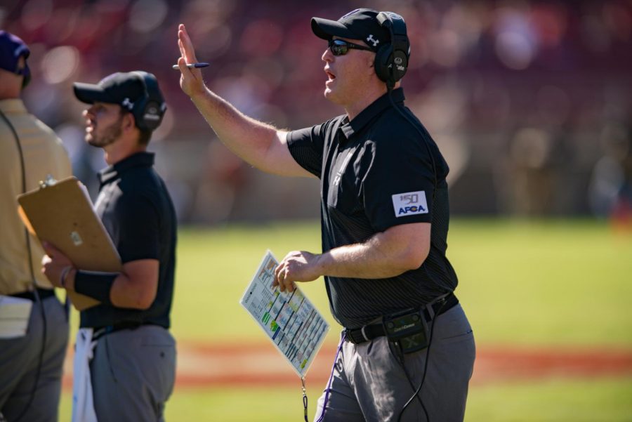 Coach Pat Fitzgerald talks to his players from the sideline. Fitzgerald spoke to Dave Revsine (Weinberg ’91) of Big Ten Network Thursday night about the impact of the Big Ten’s conference-only schedule on Northwestern’s football program.