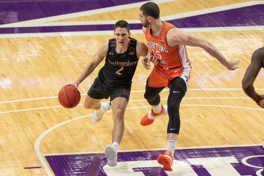 Ryan Greer drives to the basket. The junior guard was the primary point guard in Thursday’s game against Illinois.
