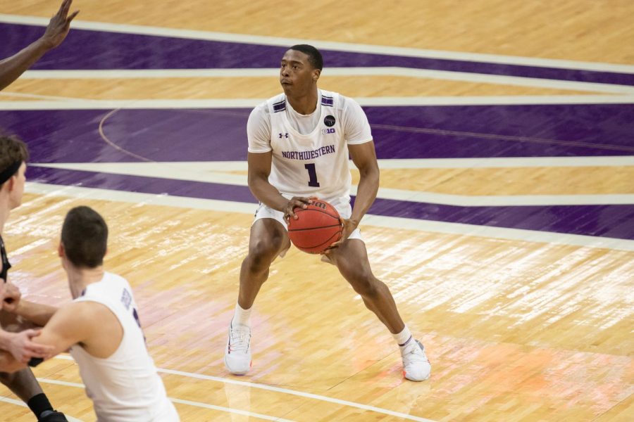 Chase Audige pulls up for a three. The sophomore guard scored 22 points against No. 5 Illinois on Tuesday.