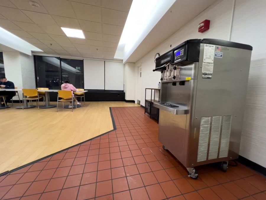 A silver ice cream machine sits at the far end of the Foster-Walker Complex East dining hall.