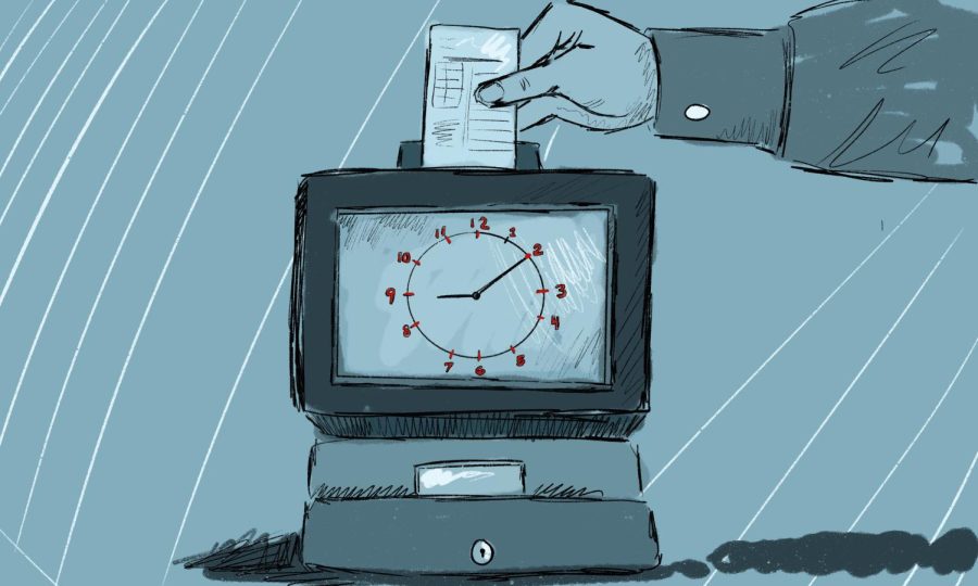 An employee time clock with a person’s hand holding a time card over it.