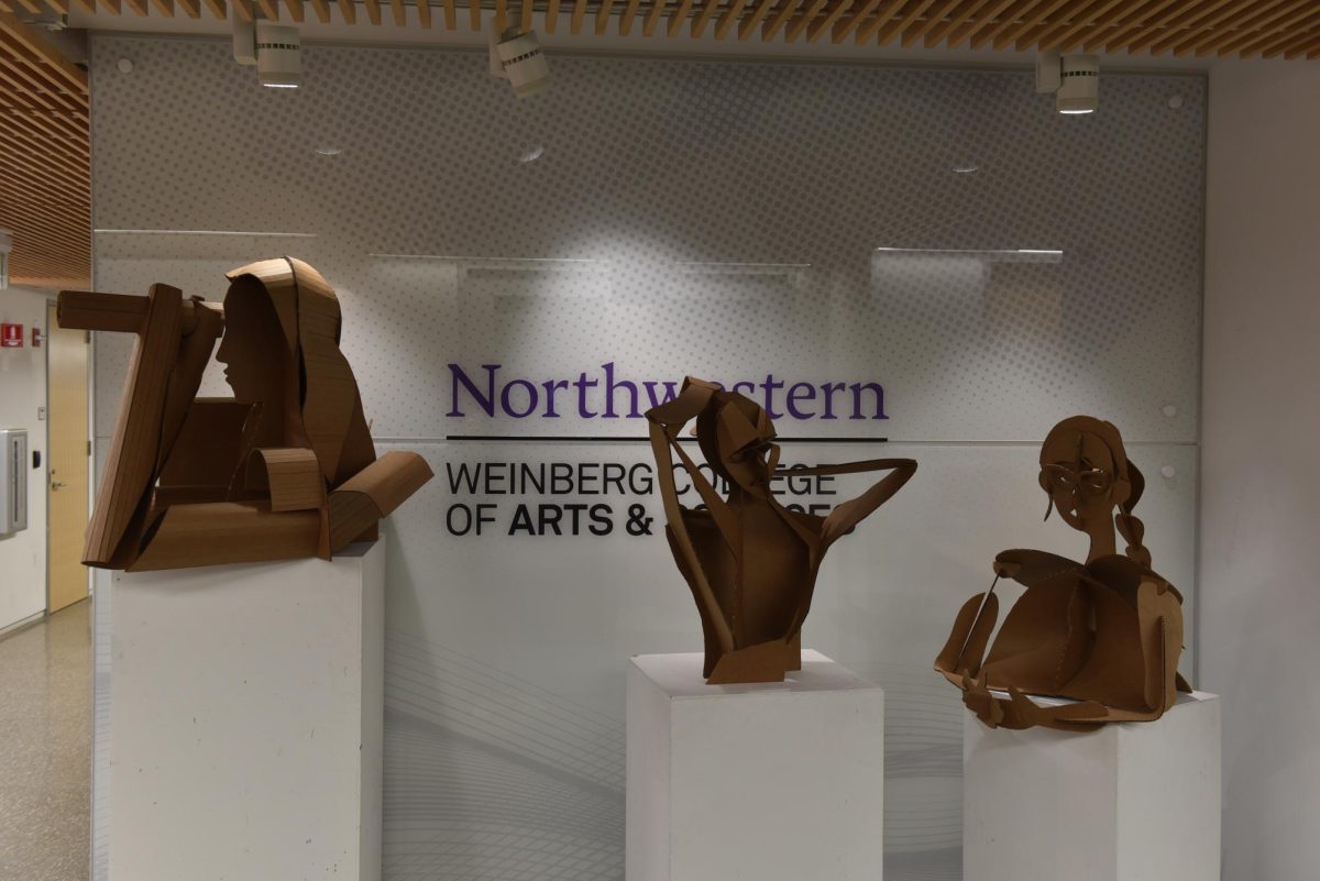 Viewings of cardboard sculptures making different gestures and performing various actions