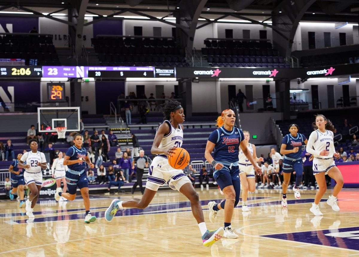 Junior guard Melannie Daley attacks the basket in transition.