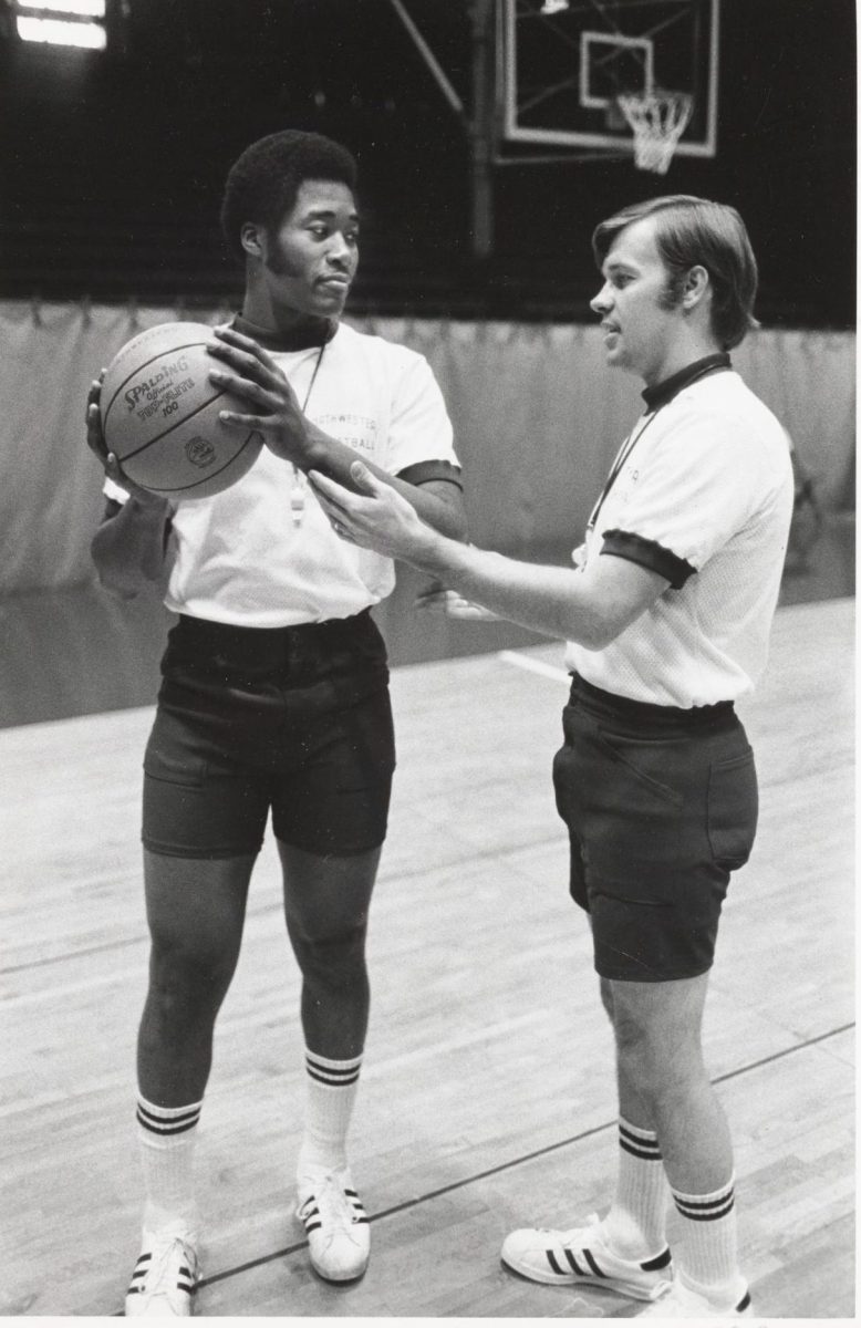 Rich Falk coaches Don Davis. Falk took Northwestern to its first ever postseason tournament at the 1983 NIT.
