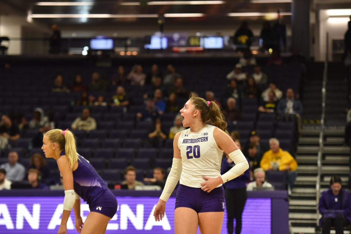 Volleyball player calls out to teammates.
