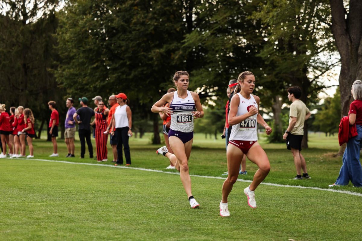 Senior Ava Earl runs in a race earlier this season.