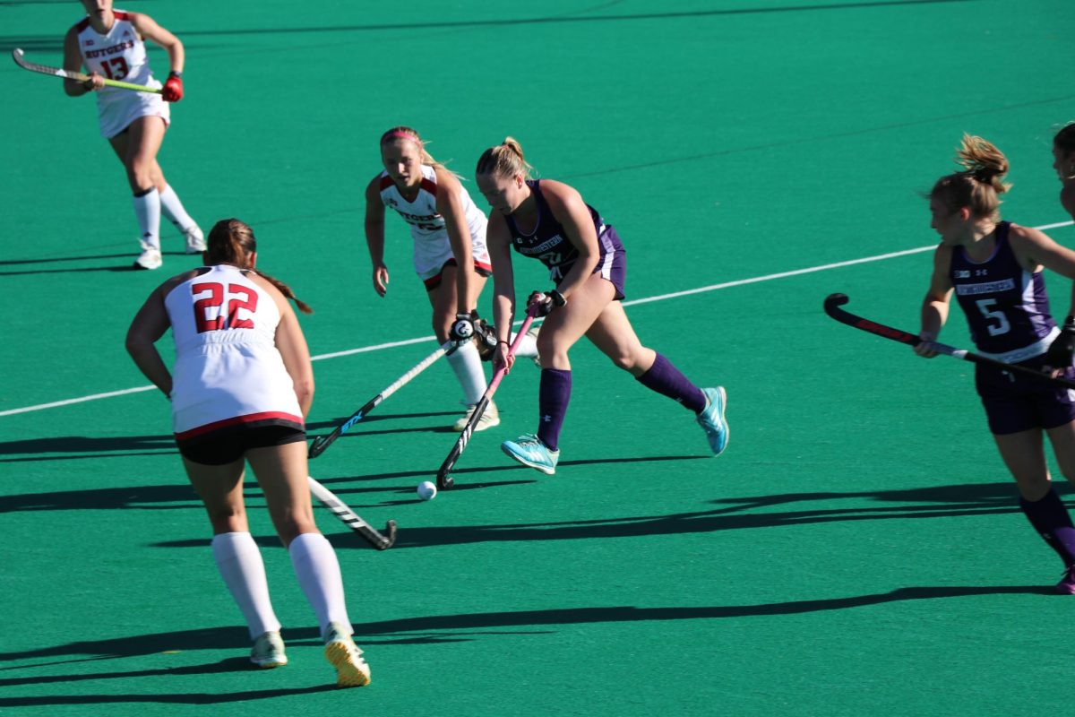 Freshman midfielder Elaine Velthuizen dribbles down the field against Rutgers Friday. 