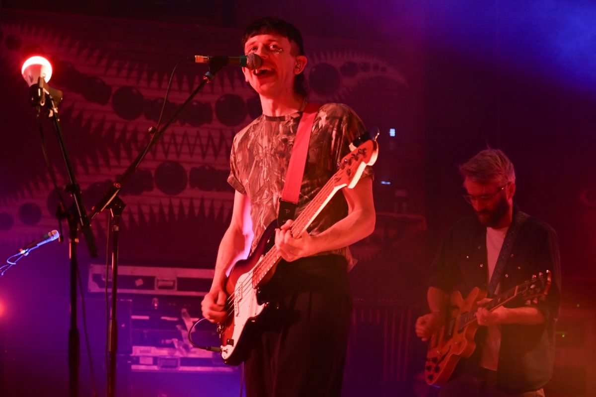 Tokyo Police Club vocalist and bassist Dave Monks sings while playing the electric bass during the band’s performance in Chicago Sunday night. 