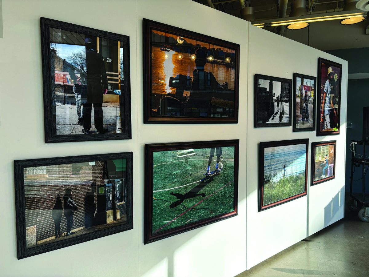 Photographs on the wall of Evanston Art Center.