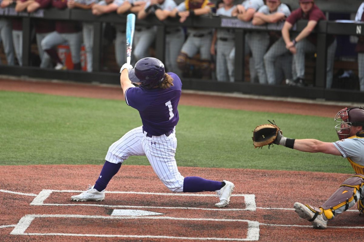 Senior outfielder Preston Knott takes a swing in a game last season.