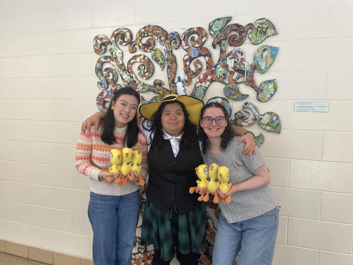 Amanda (center) and her teachers, Wendy (left) and Alex (right), pose after a successful piano lesson.