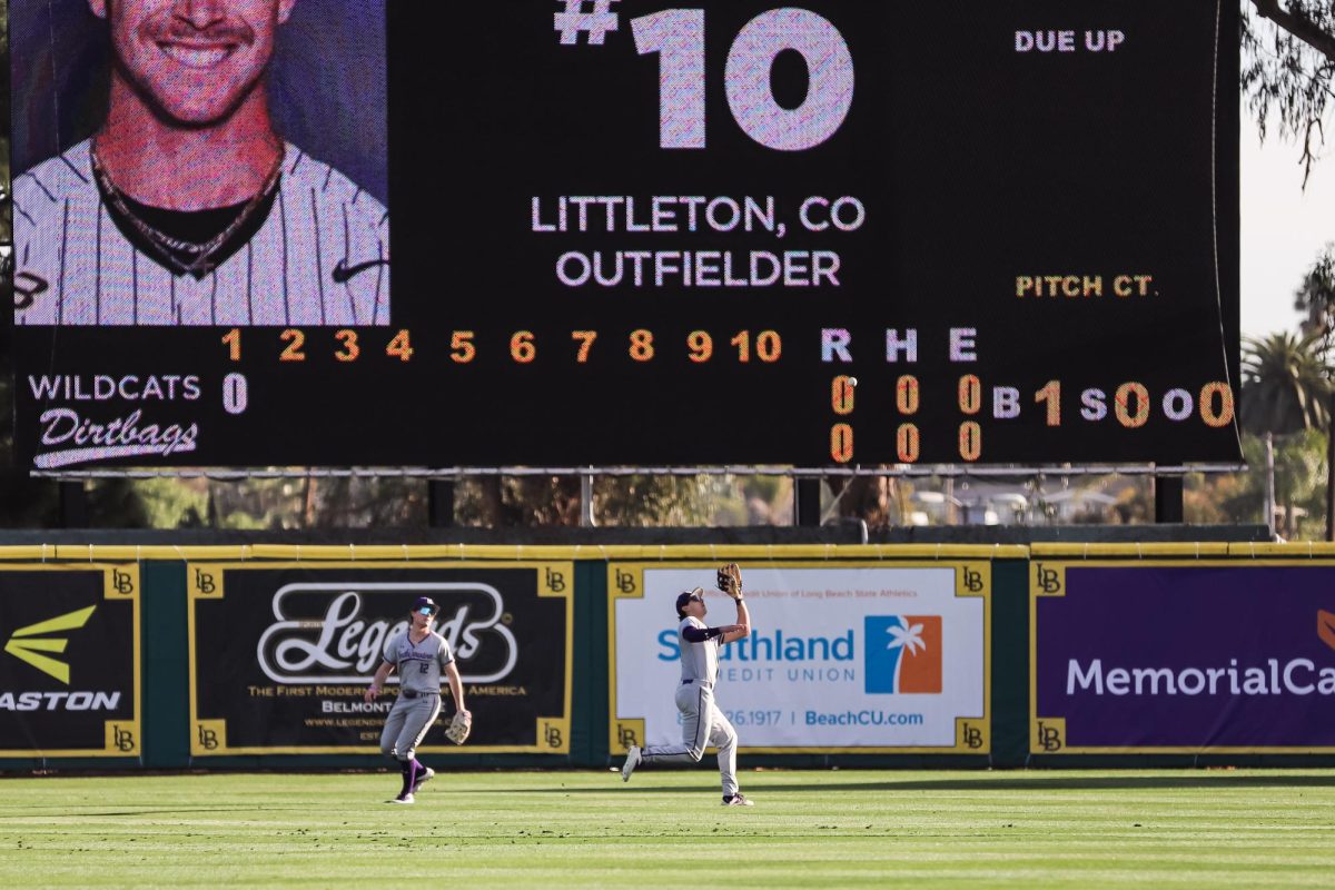 Junior outfielder — and Northwestern quarterback — Jack Lausch prepares to catch a fly ball during his first weekend playing collegiate baseball. 