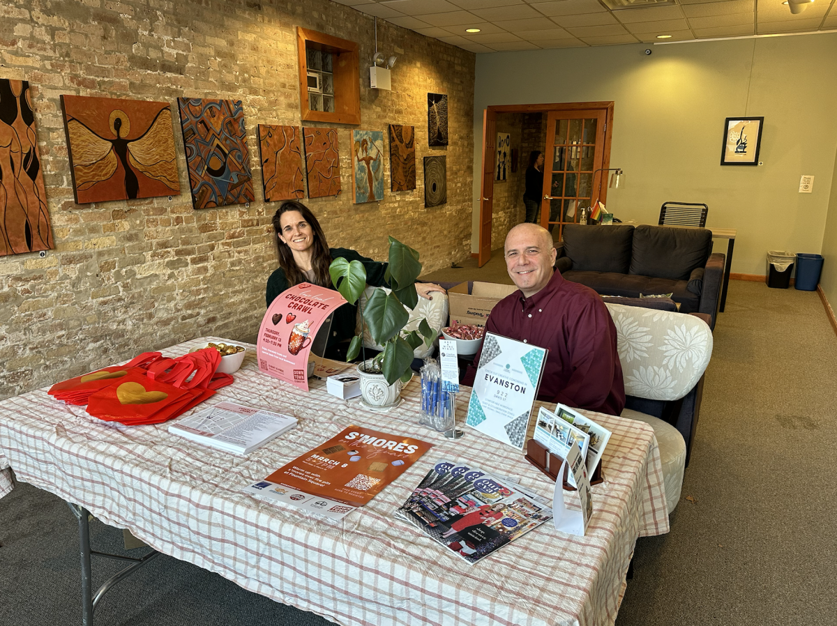 Event organizers Andy Vick and Laura Brown, both Evanston natives, help plan the chocolate crawl.