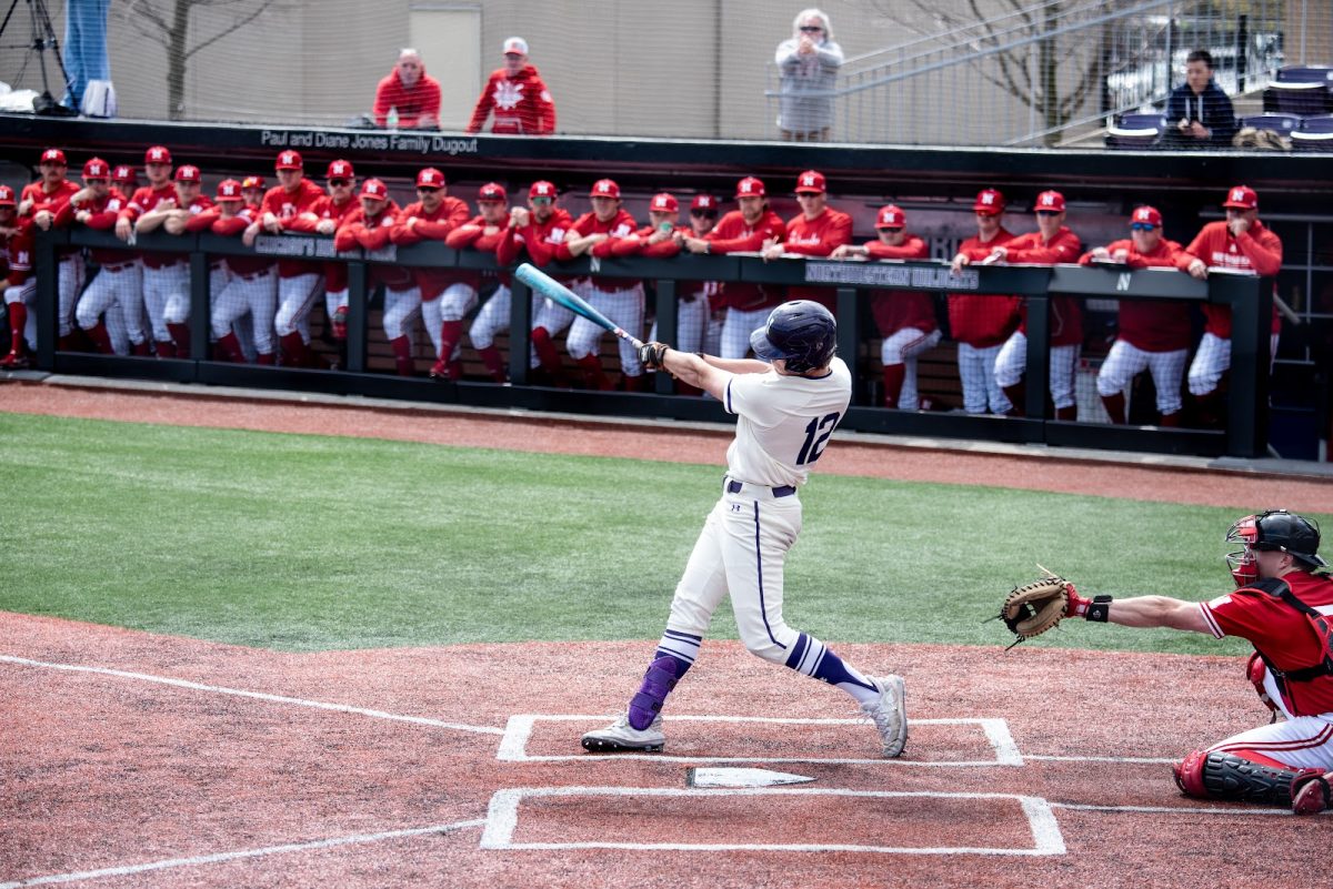 Sophomore outfielder Jackson Freeman takes a swing during a game last season.