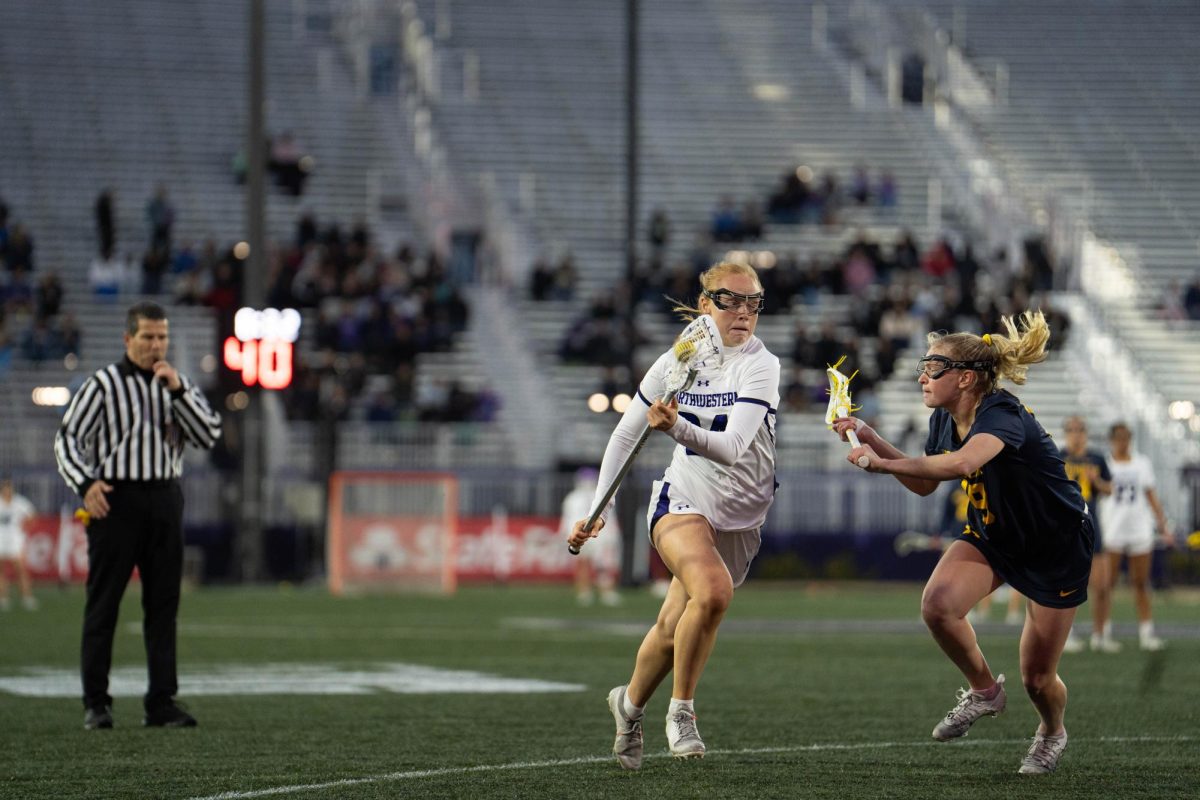 Graduate student attacker Riley Campbell on offense against No. 13 Michigan on Thursday. Campbell scored four goals against Ohio State in No. 3 Northwestern’s 20-12 win Saturday.