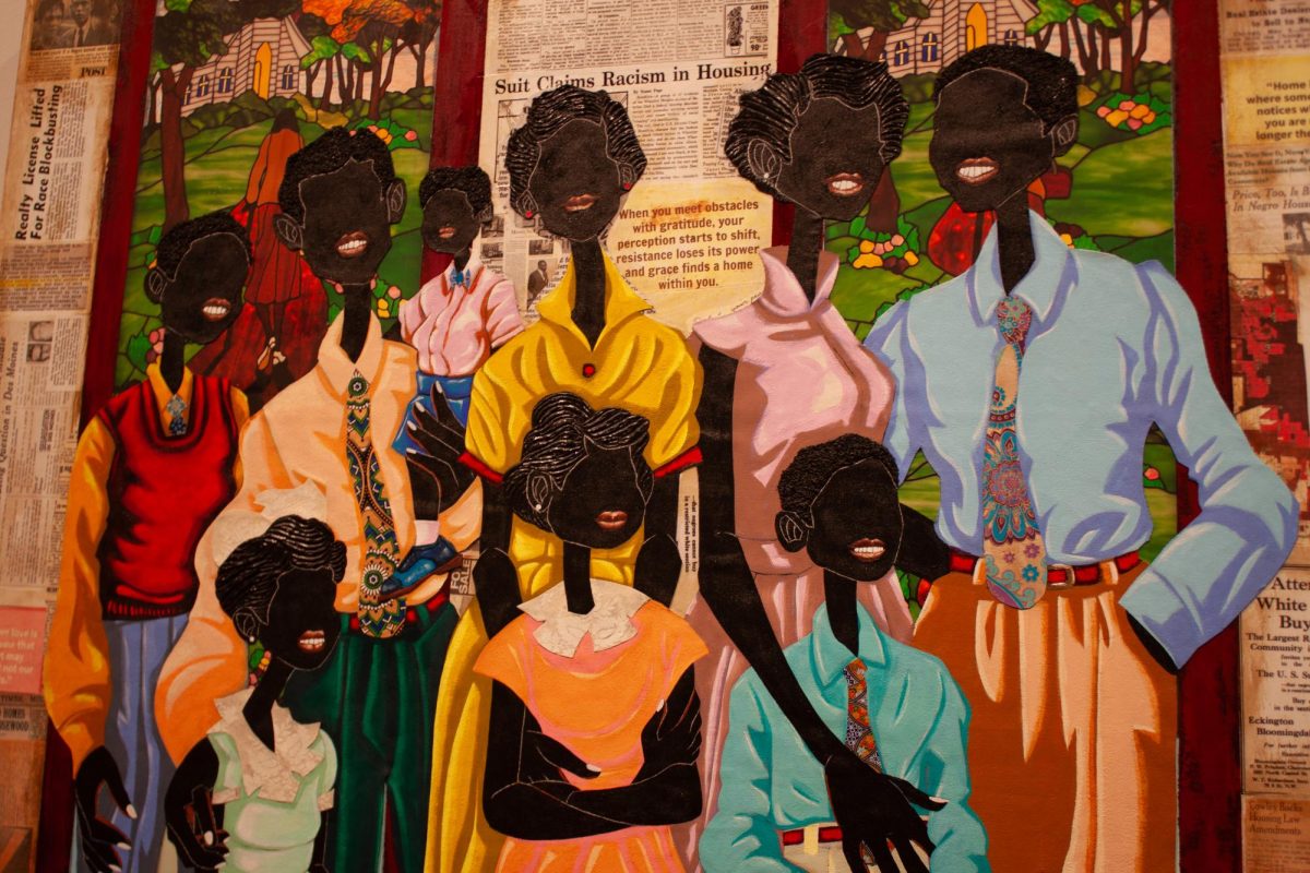 Close-up of an art piece of a Black family standing for a portrait. Behind them are newspaper clippings related to historical acts of racism toward  the Black community.