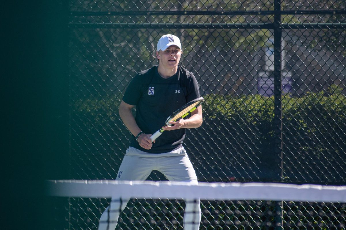 Senior Felix Nordby prepares to return serve in a match last season. Nordby has a team-high 15 singles wins this season.