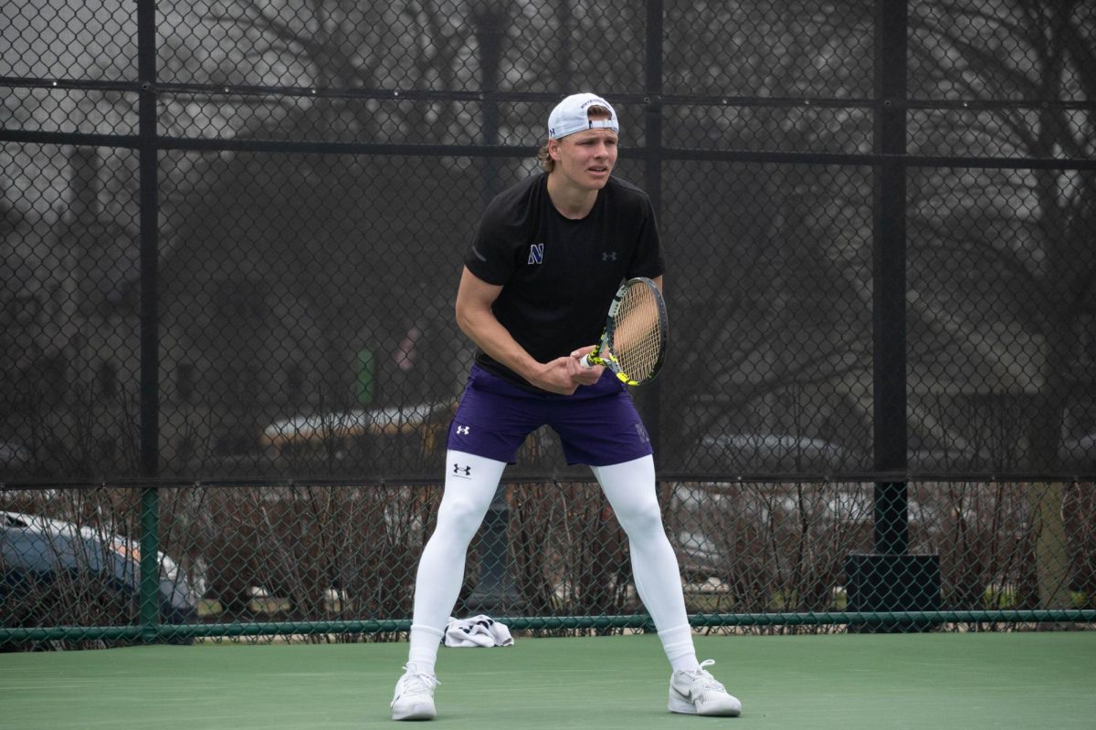 Senior Felix Nordby prepares to return a serve in a match earlier this season. Nordby played his final match of his career in a 4-0 loss to Michigan on Thursday and finished the season with a team-best 16 singles wins.