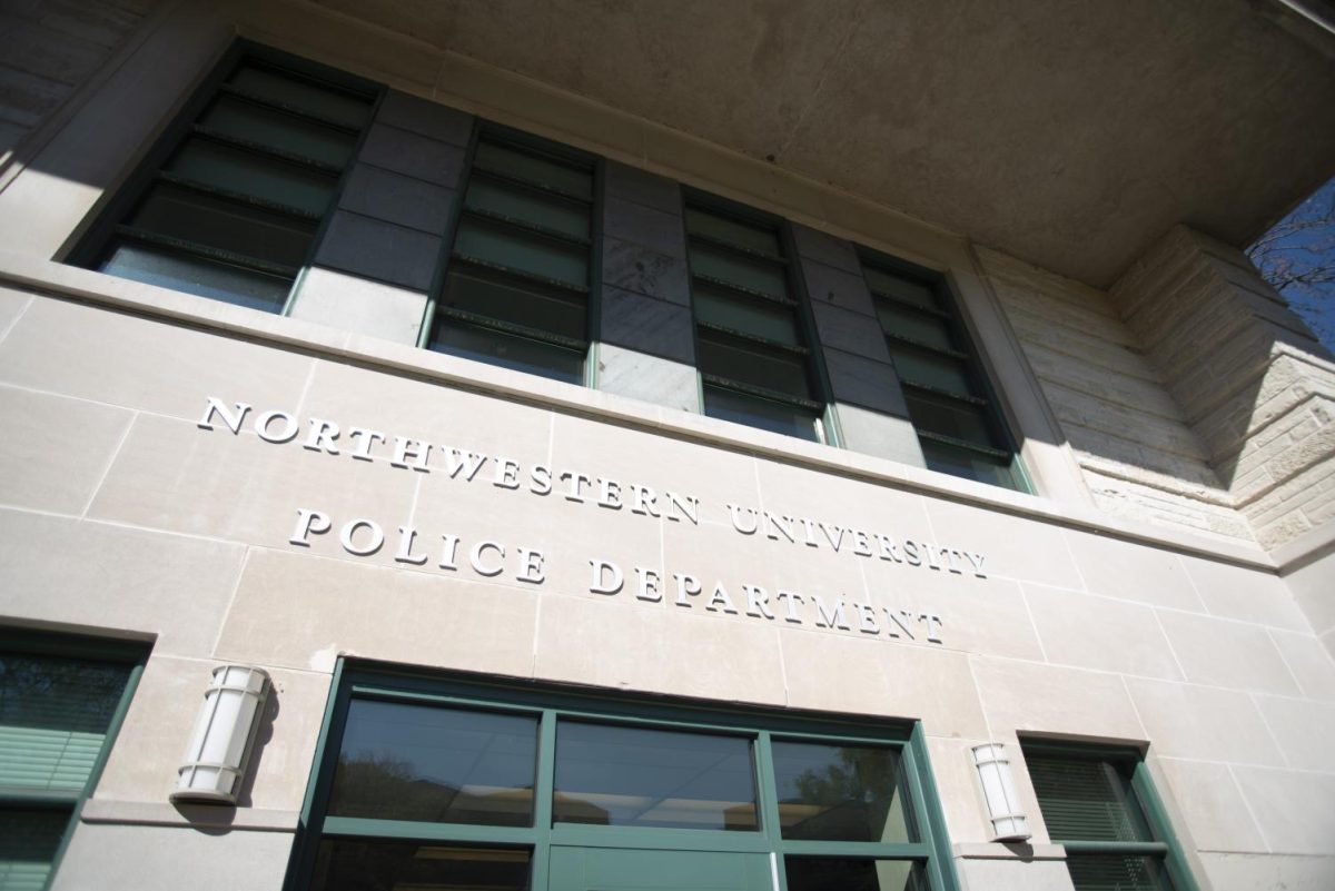 The facade of a stone building reads “Northwestern University Police Department.”