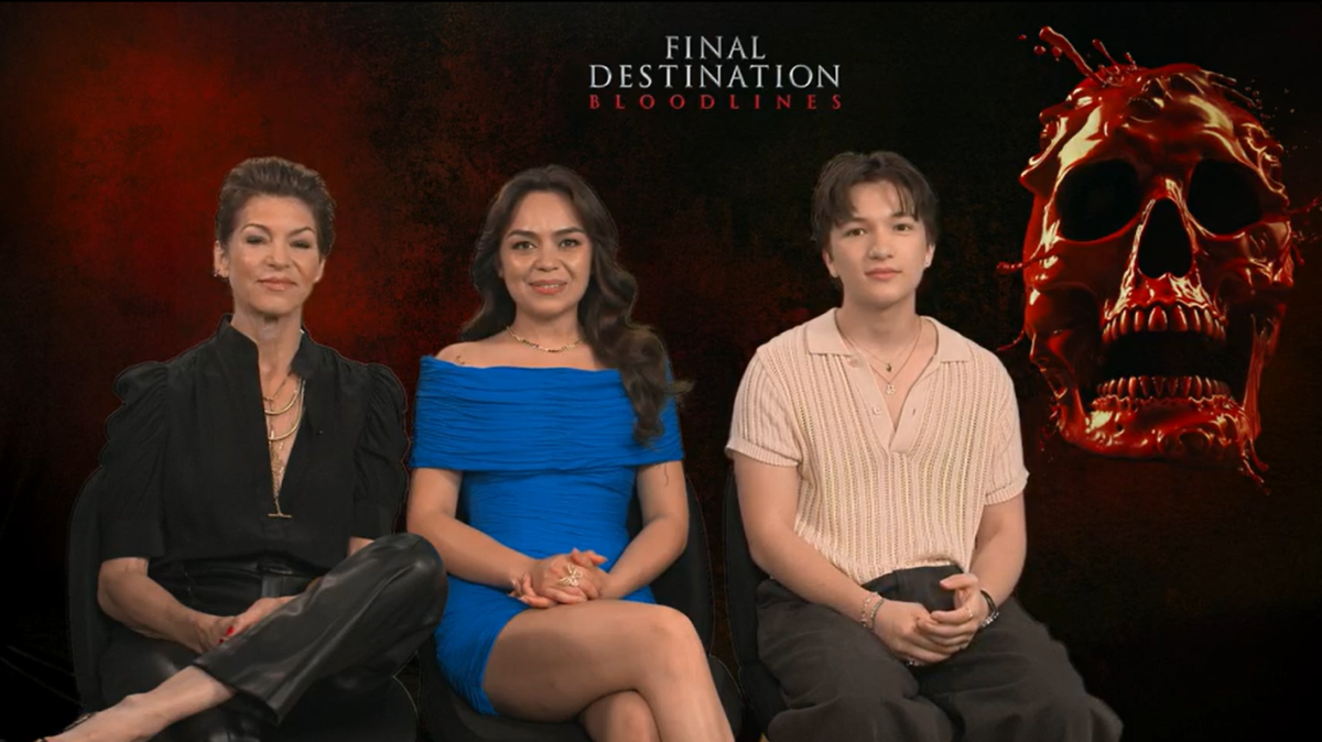 Three people sit in